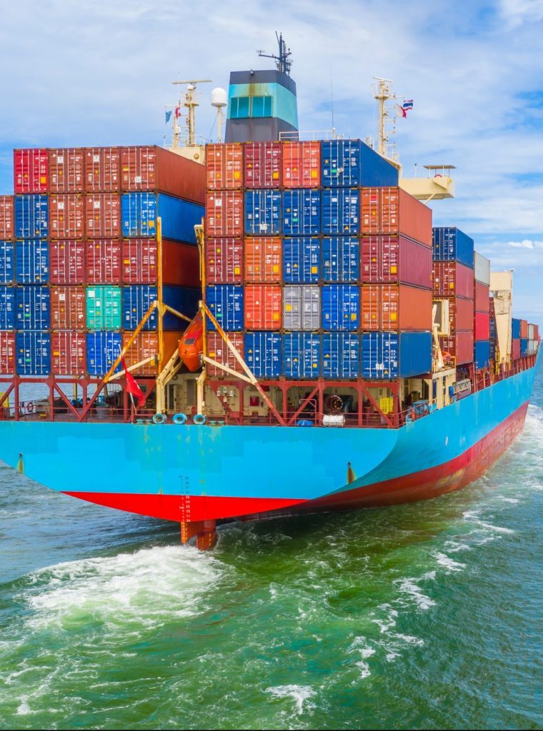 Container ship leaving the industrial port, Import and export business logistic and transportation of international by container ship in the open sea.